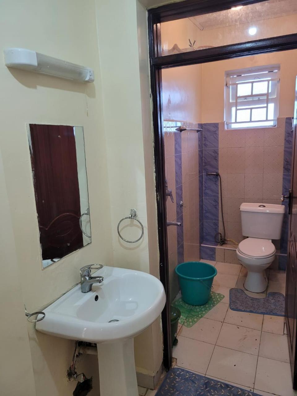 Gloria House Panzió Syokimau Kültér fotó