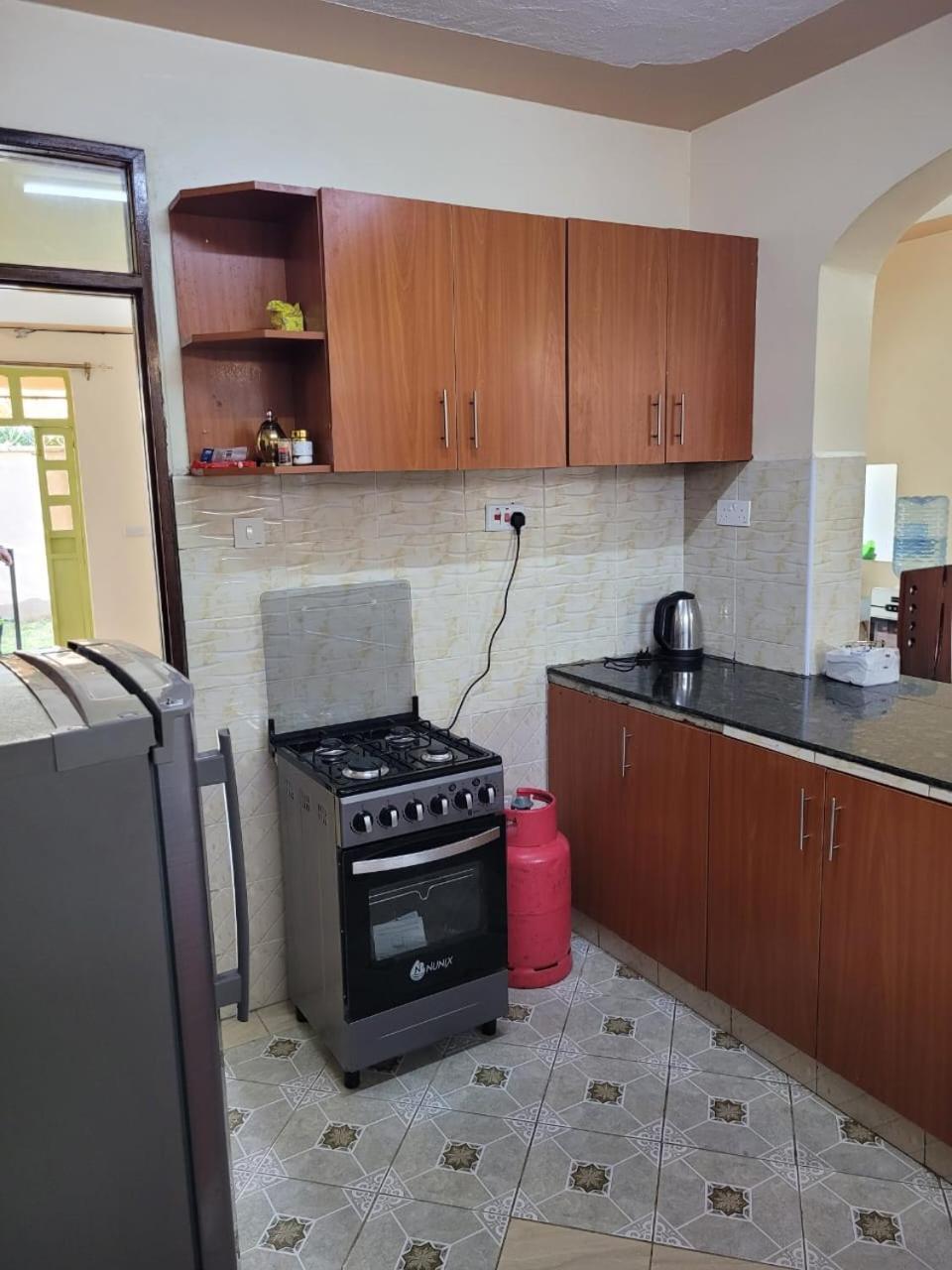 Gloria House Panzió Syokimau Kültér fotó